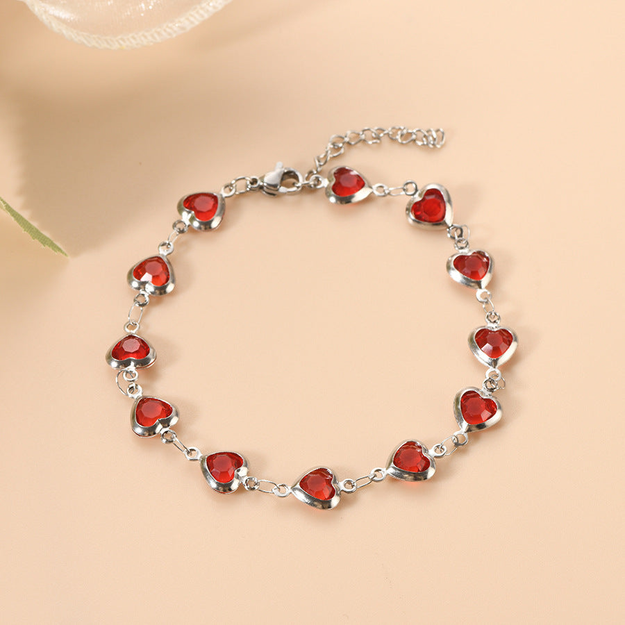 Pulseira de Cadeia em Prata com Coração de Rubi